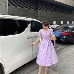 Purple cotton dress embossed with daisy